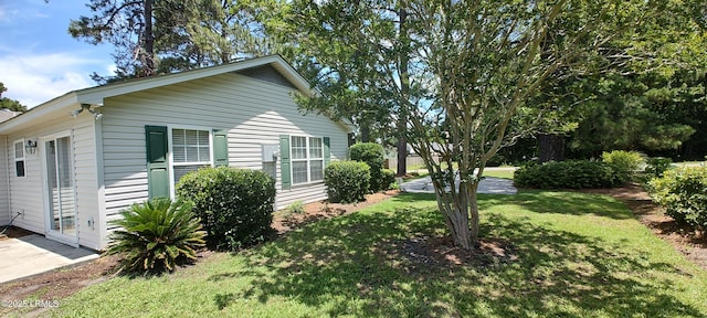 15 Grackle Ln, Beaufort, SC 29906 - view of home's exterior featuring a lawn
