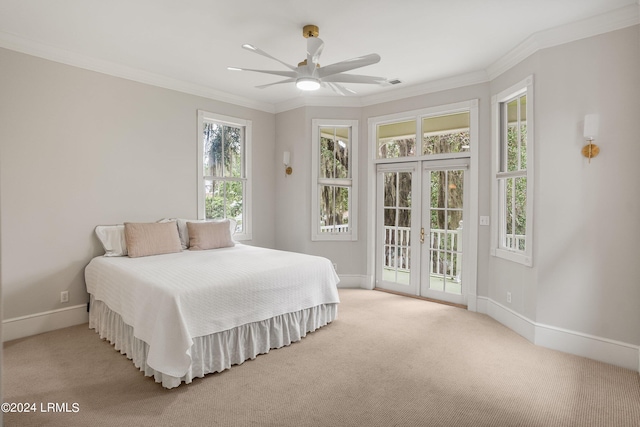 bedroom featuring light colored carpet, access to exterior, ceiling fan, crown molding, and french doors