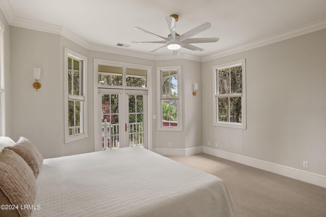 carpeted bedroom featuring crown molding, access to outside, and ceiling fan