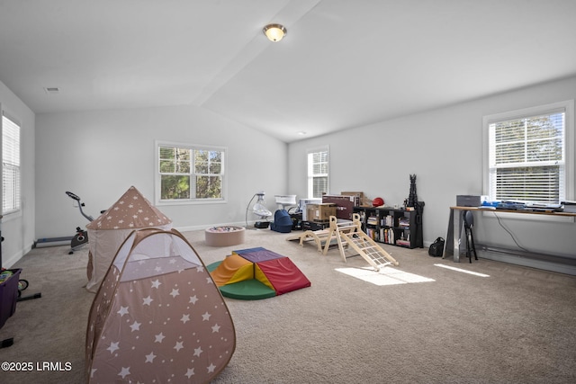 playroom with lofted ceiling, baseboards, a healthy amount of sunlight, and carpet flooring