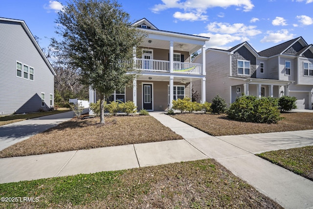 view of front of house with covered porch and a balcony