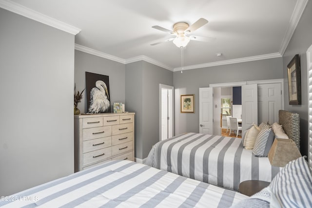 bedroom with ceiling fan, ornamental molding, and baseboards