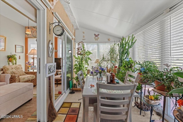 sunroom with vaulted ceiling