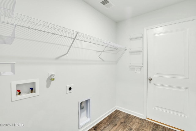 clothes washing area with laundry area, visible vents, dark wood-style floors, hookup for a washing machine, and hookup for an electric dryer