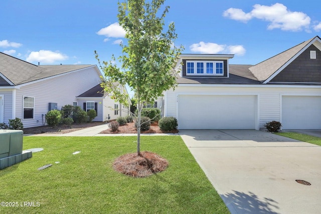 view of front of house featuring concrete driveway and a front lawn