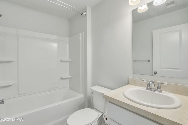 bathroom with visible vents, shower / bathing tub combination, vanity, and toilet