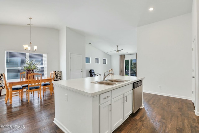 kitchen featuring pendant lighting, a center island with sink, stainless steel dishwasher, white cabinetry, and a sink