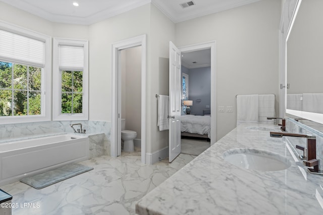 bathroom with a bath, ornamental molding, and toilet