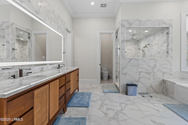 bathroom with vanity, ornamental molding, toilet, and walk in shower