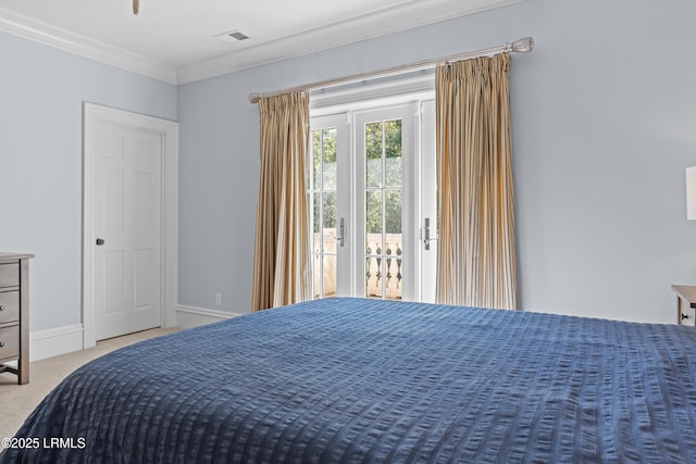 carpeted bedroom with crown molding and access to exterior