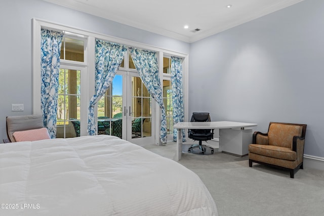 carpeted bedroom featuring french doors, crown molding, and access to outside