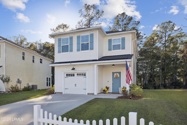 view of front of house featuring central AC unit, a garage, and a front yard