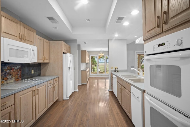 647 Island Cir E, Saint Helena Island, SC 29920 - kitchen with white appliances, a sink, light brown cabinetry, wood finished floors, and recessed lighting