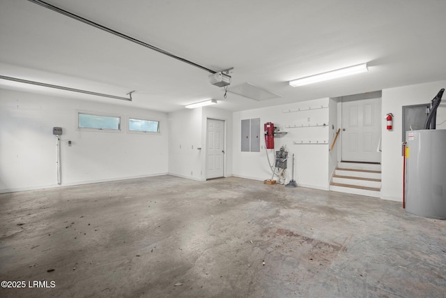 647 Island Cir E, Saint Helena Island, SC 29920 - garage featuring a garage door opener and water heater