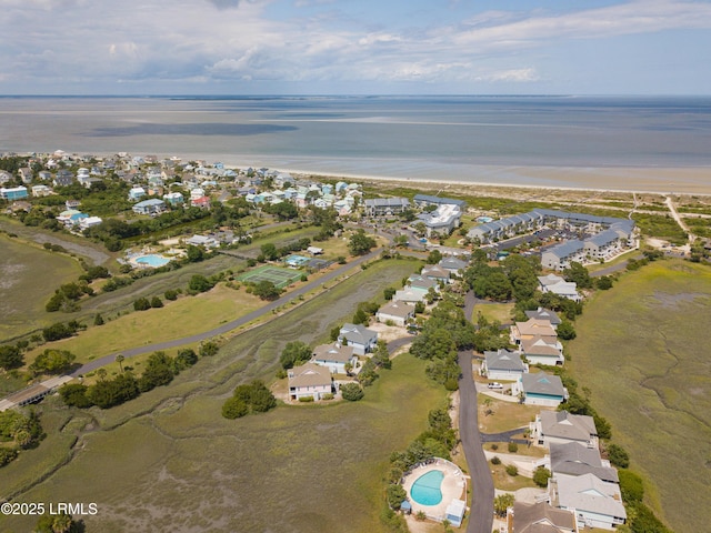 birds eye view of property featuring a residential view and a water view