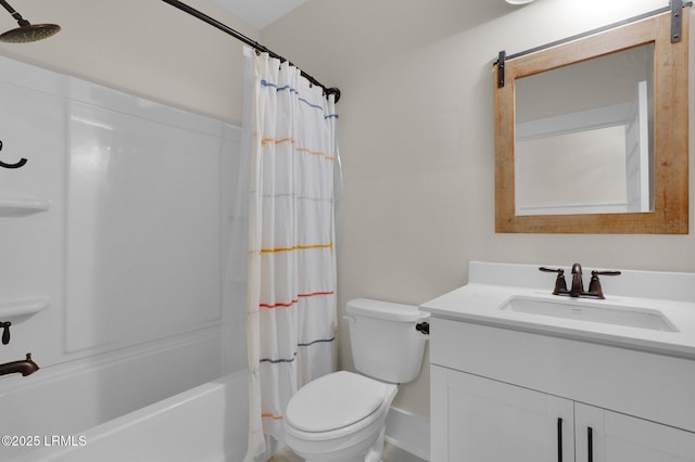 bathroom with shower / tub combo, vanity, and toilet