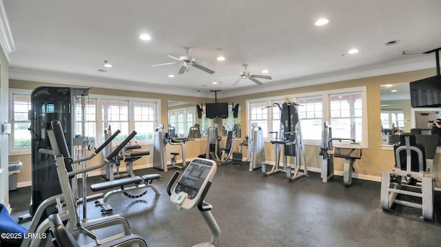 workout area with recessed lighting, a healthy amount of sunlight, ornamental molding, ceiling fan, and baseboards