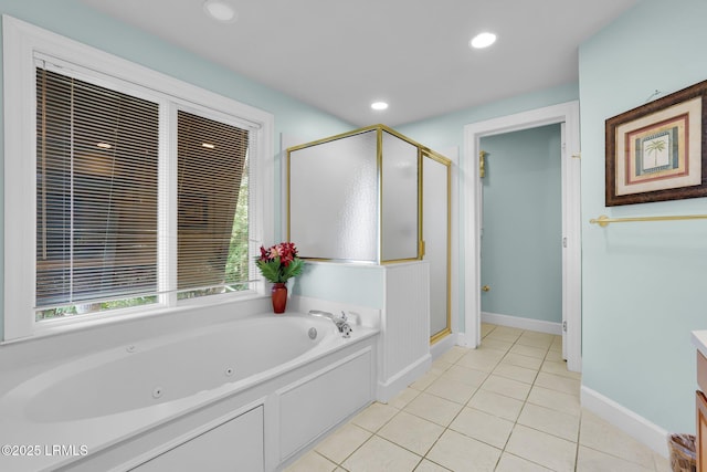 bathroom with independent shower and bath, vanity, and tile patterned floors