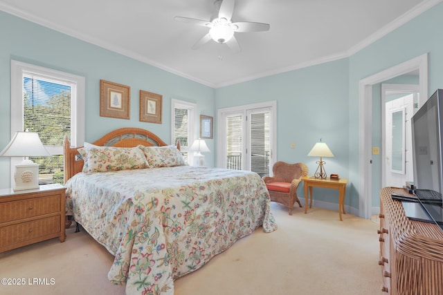 carpeted bedroom with crown molding, ceiling fan, and multiple windows