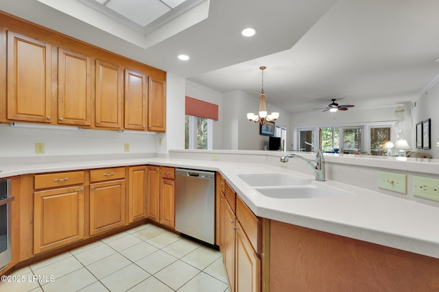 kitchen with sink, light tile patterned floors, dishwasher, hanging light fixtures, and kitchen peninsula