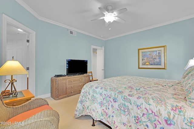 bedroom featuring crown molding, ceiling fan, and light carpet