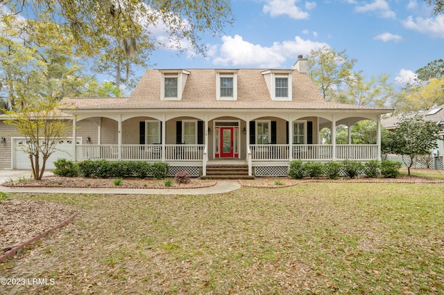 view of front of property featuring roof with shingles, a chimney, a porch, an attached garage, and a front yard