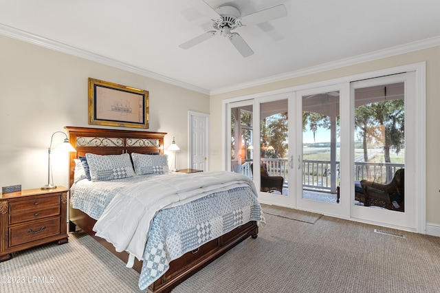 bedroom featuring ceiling fan, light carpet, visible vents, access to exterior, and crown molding