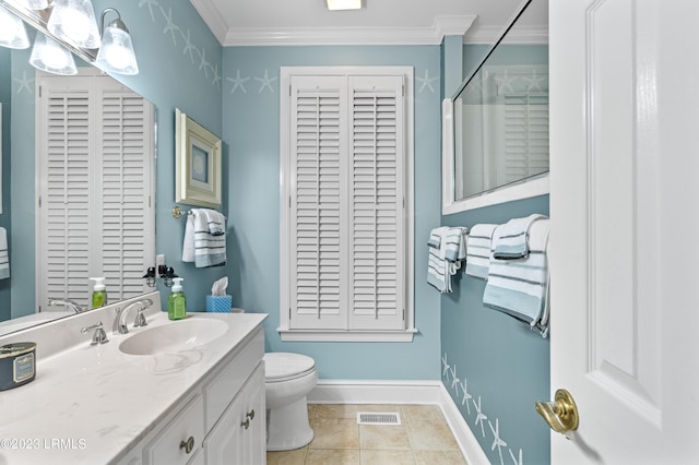 bathroom with toilet, vanity, visible vents, ornamental molding, and a closet