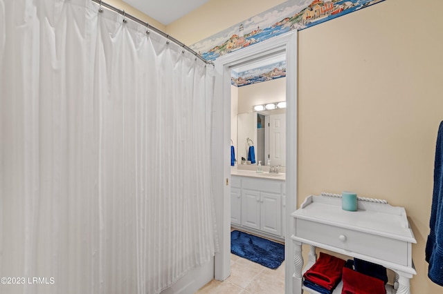 full bath with tile patterned flooring, vanity, and a shower with shower curtain