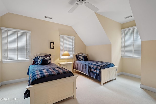 carpeted bedroom with lofted ceiling, visible vents, ceiling fan, and baseboards