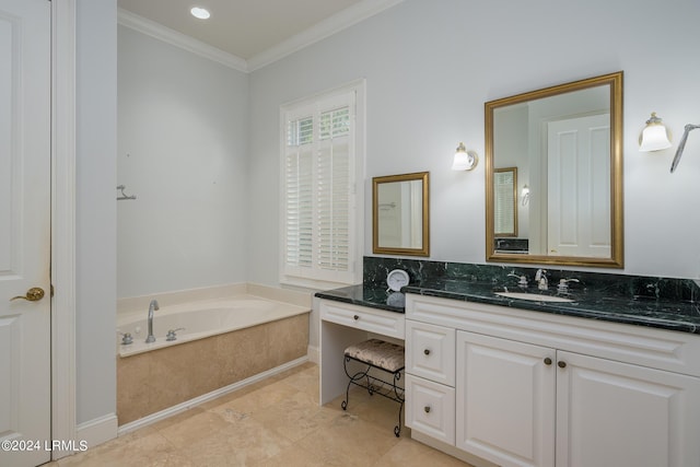 bathroom featuring crown molding, vanity, and a bathing tub