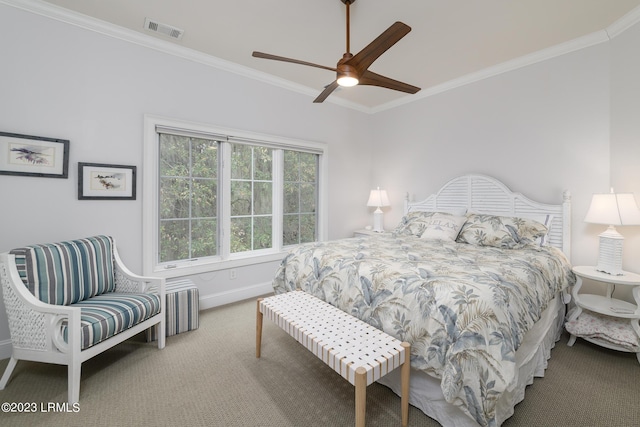 bedroom featuring crown molding, ceiling fan, and carpet