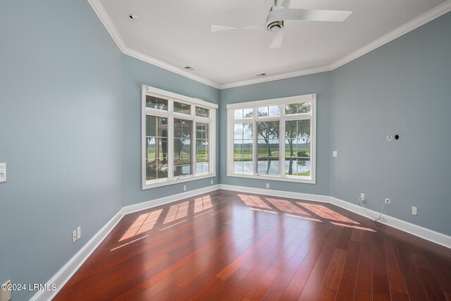 unfurnished room with ceiling fan, ornamental molding, and hardwood / wood-style floors