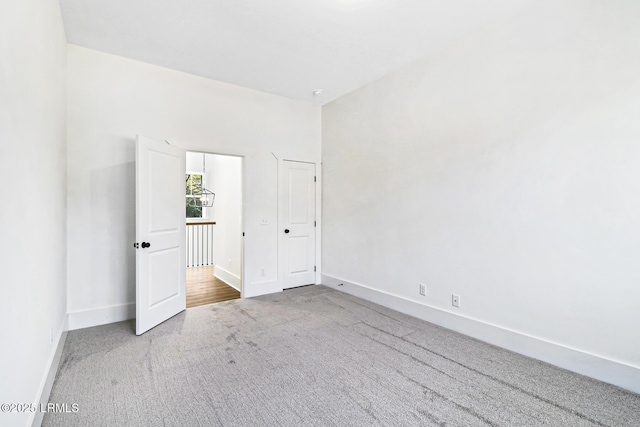 unfurnished bedroom with carpet