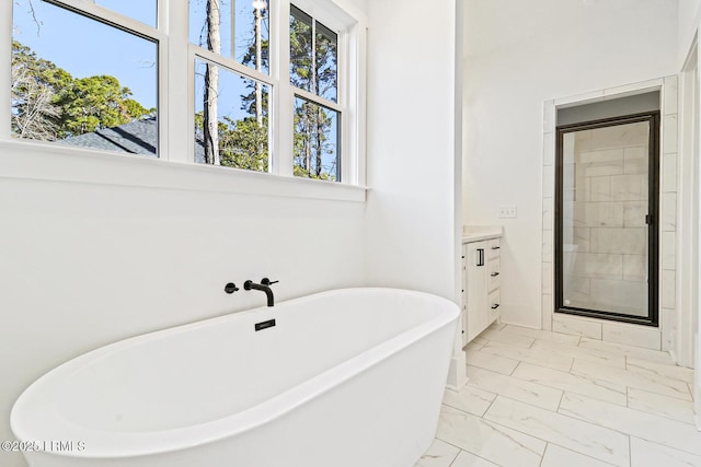 bathroom with vanity and plus walk in shower