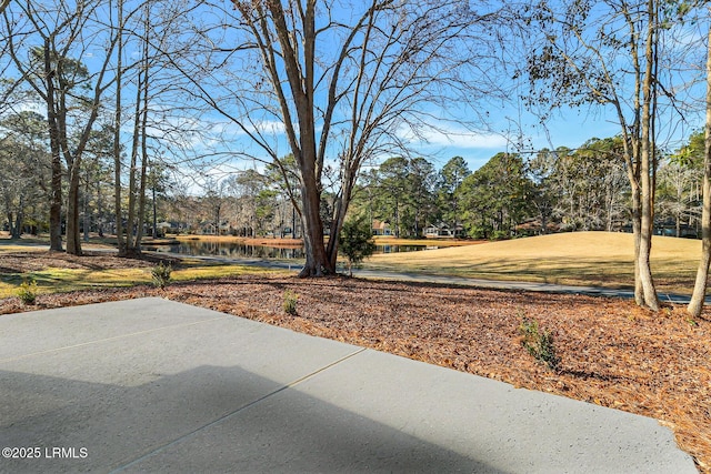 view of yard with a water view