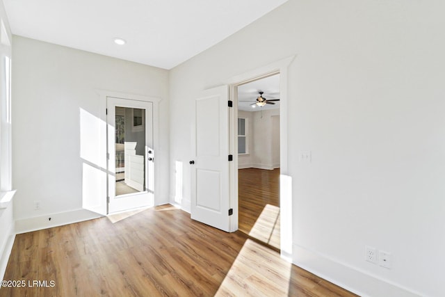 unfurnished room featuring hardwood / wood-style floors