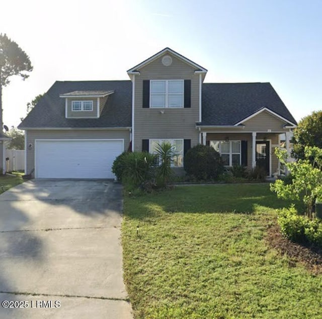 6 Broadland Cir, Bluffton, SC 29910 - view of front of home featuring concrete driveway, a front lawn, and an attached garage