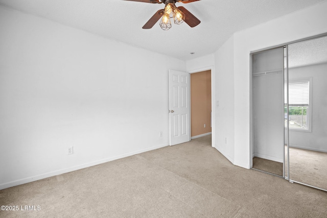 6 Broadland Cir, Bluffton, SC 29910 - unfurnished bedroom featuring carpet flooring, a closet, a textured ceiling, baseboards, and a ceiling fan
