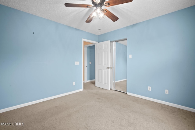 6 Broadland Cir, Bluffton, SC 29910 - unfurnished bedroom with carpet, baseboards, a textured ceiling, a closet, and a ceiling fan