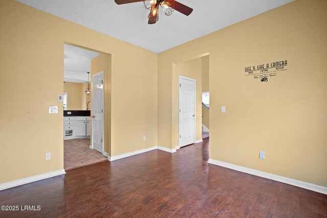 6 Broadland Cir, Bluffton, SC 29910 - spare room with a ceiling fan, wood finished floors, and baseboards