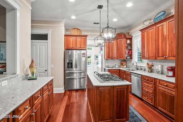 120 Coosaw Club Dr, Beaufort, SC 29907 - kitchen with stainless steel appliances, a sink, dark wood-type flooring, backsplash, and brown cabinets