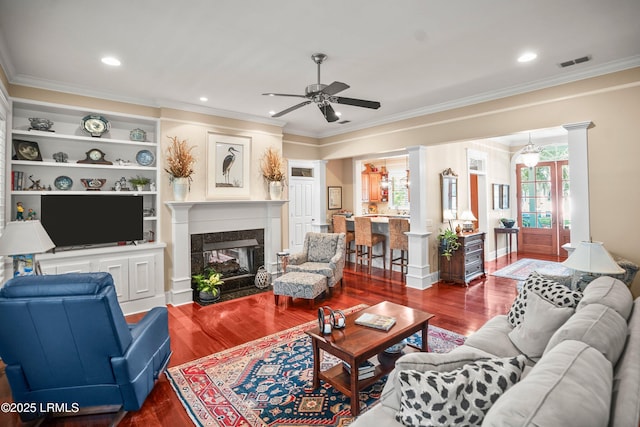 120 Coosaw Club Dr, Beaufort, SC 29907 - living room featuring a ceiling fan, wood finished floors, crown molding, a fireplace with flush hearth, and recessed lighting
