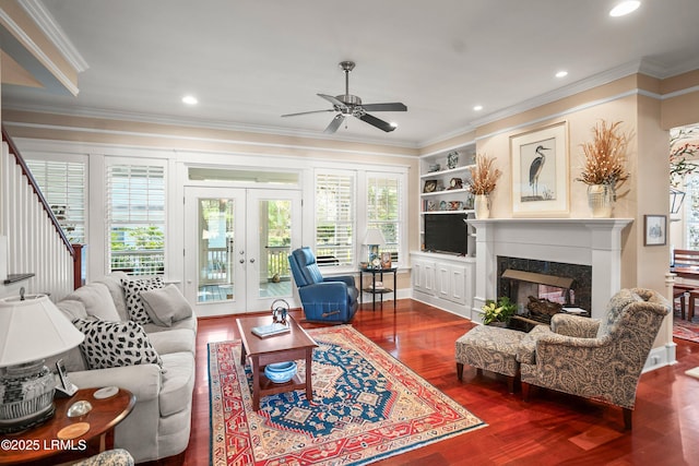 120 Coosaw Club Dr, Beaufort, SC 29907 - living area with crown molding, wood finished floors, ceiling fan, french doors, and a premium fireplace