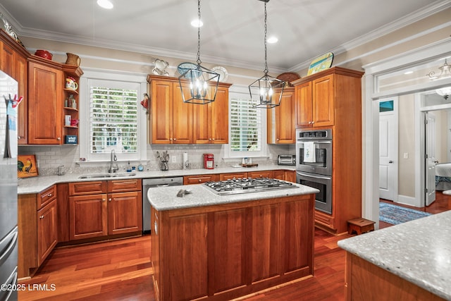 120 Coosaw Club Dr, Beaufort, SC 29907 - kitchen featuring a sink, stainless steel appliances, crown molding, backsplash, and dark wood finished floors