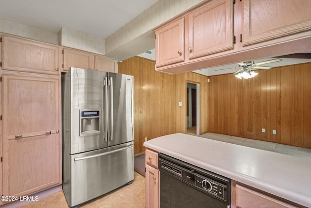 kitchen featuring wooden walls, dishwasher, ceiling fan, stainless steel refrigerator with ice dispenser, and light brown cabinets