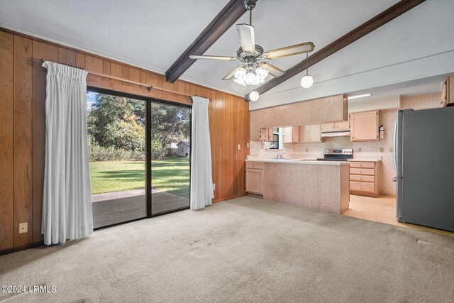 kitchen with light brown cabinetry, vaulted ceiling with beams, sink, kitchen peninsula, and stainless steel appliances