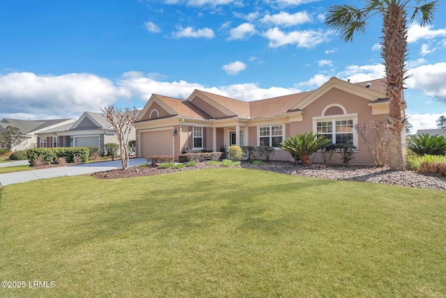 ranch-style home featuring driveway, a front yard, an attached garage, and stucco siding