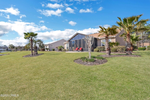 view of yard featuring glass enclosure