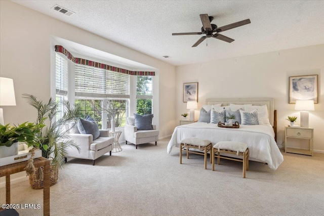 6 Pinyon Dr, Bluffton, SC 29909 - bedroom featuring carpet flooring, a textured ceiling, a ceiling fan, and baseboards